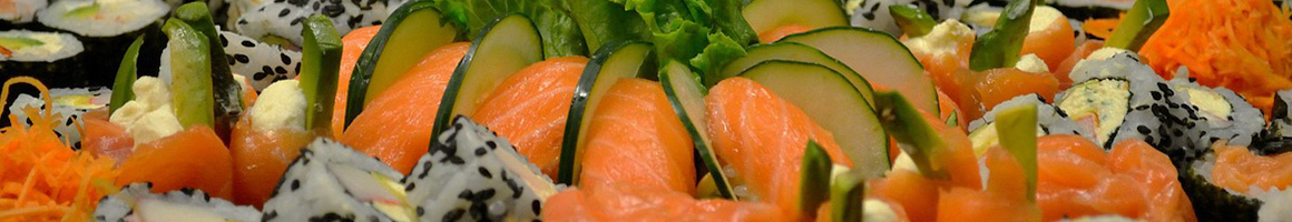 Eating Japanese Sushi at Sushi Damo restaurant in New York, NY.